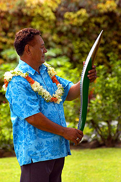 As the Queens Baton arrives in the Cook Islands and travels around the capital, Rarotonga it is welcomed by the Queen's Representative, Sir Frederick Goodwin.